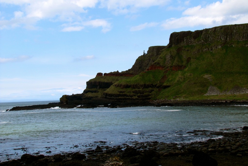 This is the headland on the beach just past the Giant's Causeway. I'm not sure if the little pillars you can see on it are natural or man-made.