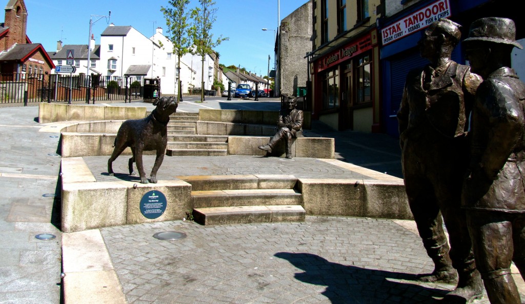 Okay. Saw these statues in the streets in Downpatrick and went to have a look. They are of Lynn Doyle, a Downpatrick writer, and three characters (a dog and two men) from one of his short stories. I got the low-down on him from an elderly nun and three of her friends, and then a little bit more from a clerk in a nearby store where I went to buy something to drink. The Downpatrick folks are all so friendly!