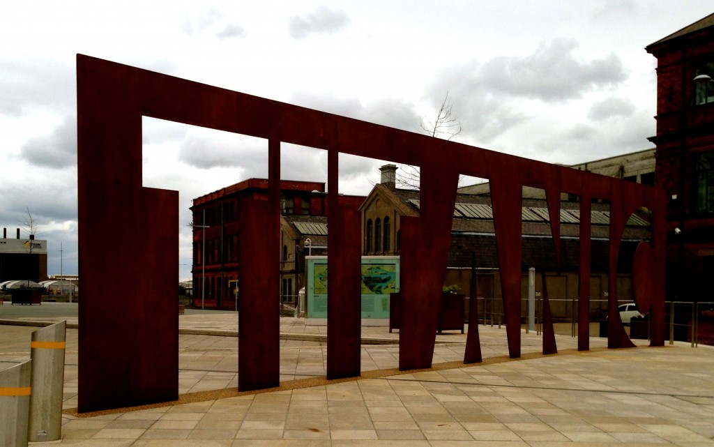 And a big sign out front in case you forget where you are. It's made of sixteen tons of steel, the same as Titanic's anchor. This is one of the brief moments in the sign's life when there are no tourists posing in the letters.