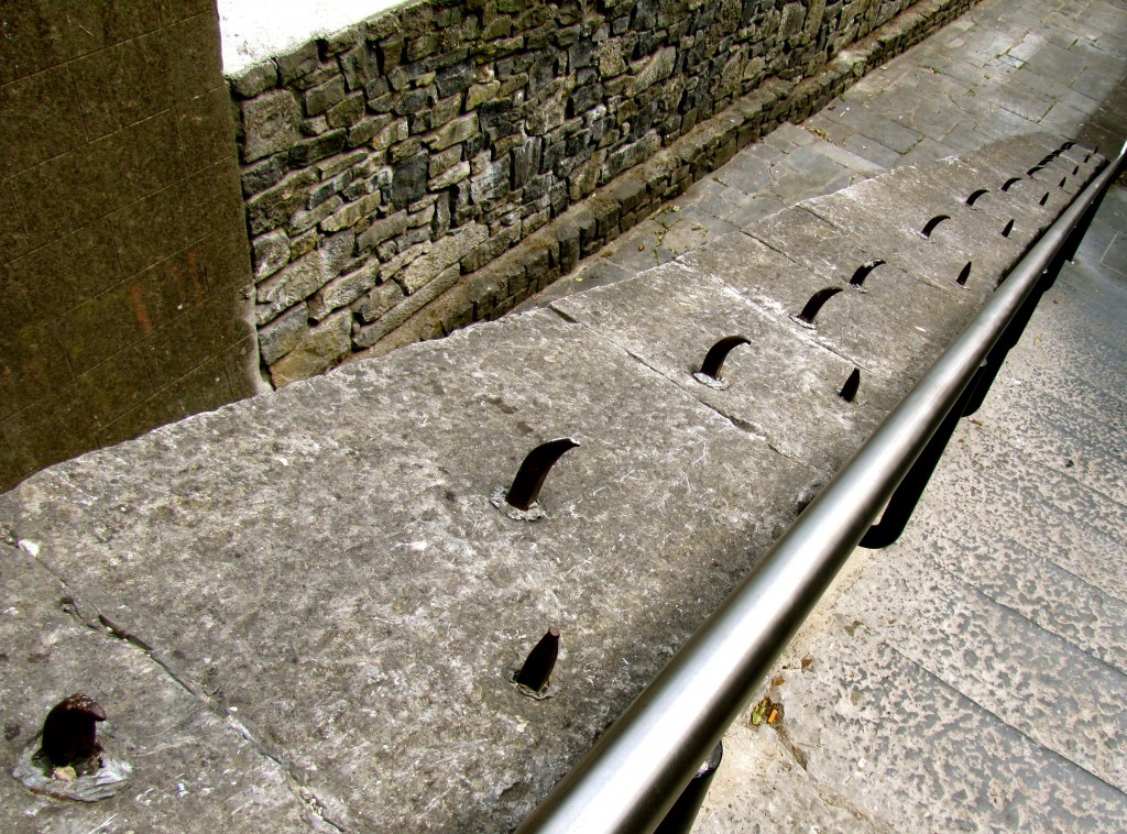 Whoever made the stairs leading up this alley really, really hated skateboarders. Those spikes are about two inches long.
