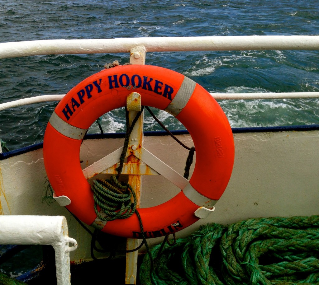 Yes, the name of the ferry is Happy Hooker. It's important to point out that a Galway Hooker is a type of traditional fishing boat.