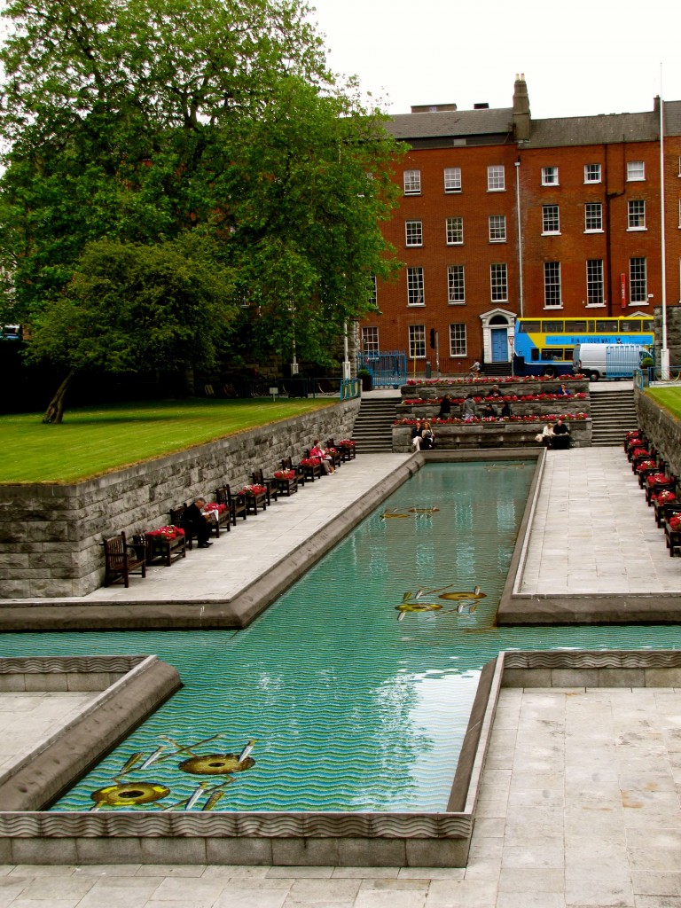 The reflecting pool is cross-shaped to honour Christianity. The mosaic in the pool honours the pre-Christian heritage of the island, showing Celtic weapons tossed down in honour of fallen warriors. There are numerous benches here, and it's a popular picnic spot.