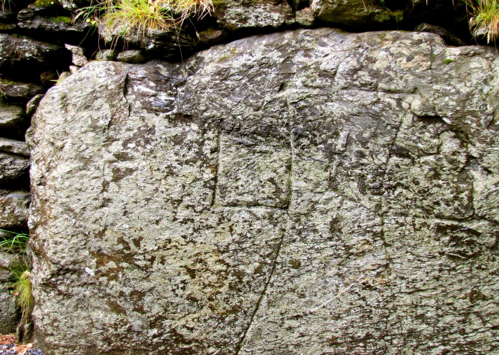 Just inside the gates is a stone inscribed with a cross. This is the Sanctuary Stone. In medieval times, if you were in trouble, and you could get to the monastery and touch the stone, you were granted sanctuary for up to 90 days.