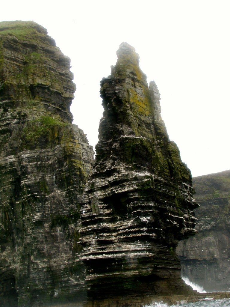 This spire of rock at the base of the cliffs is just awe-inspiring.