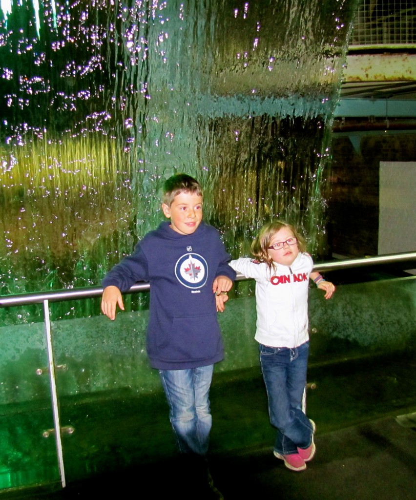 Here are the kids by the waterfall. They were fascinated by the fact that, in the water overhead, there were coins that were not being washed over the falls.