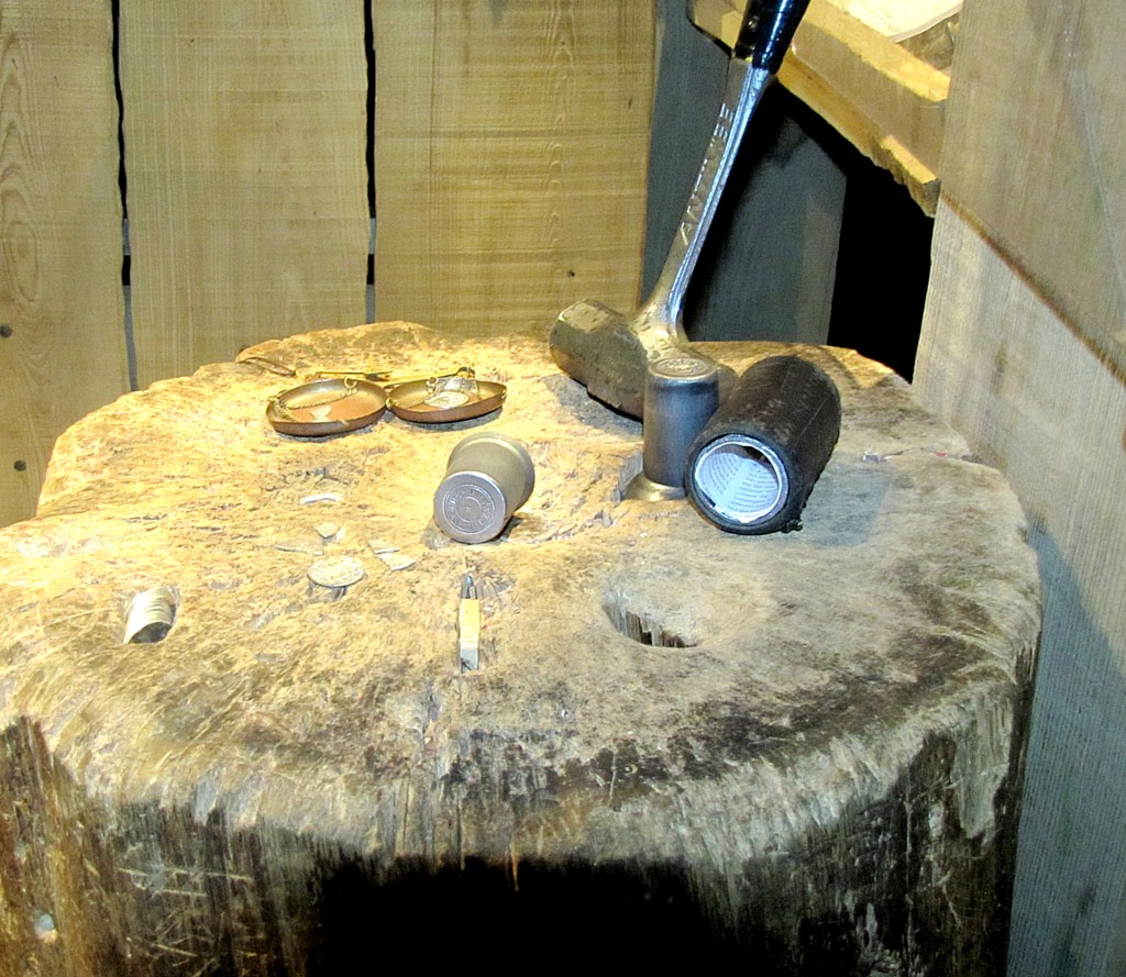 There was a really nice fellow here, at this coin-striking demonstration. I got him to strike a coin for me, which was very cool, and he let me take this picture of his tools and props.