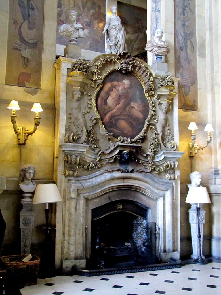 In the main entry hall. The painting over the fireplace is Vulcan at his forge.