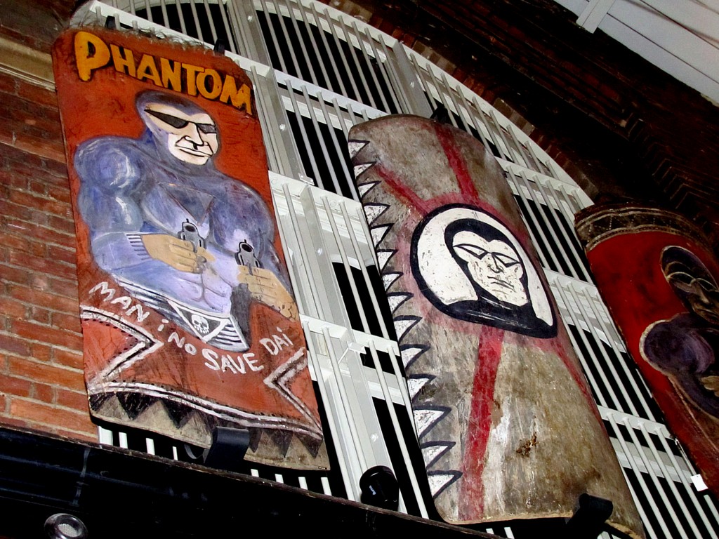 Shields from New Guinea tribesmen painted with the image of the comic book character the Phantom.