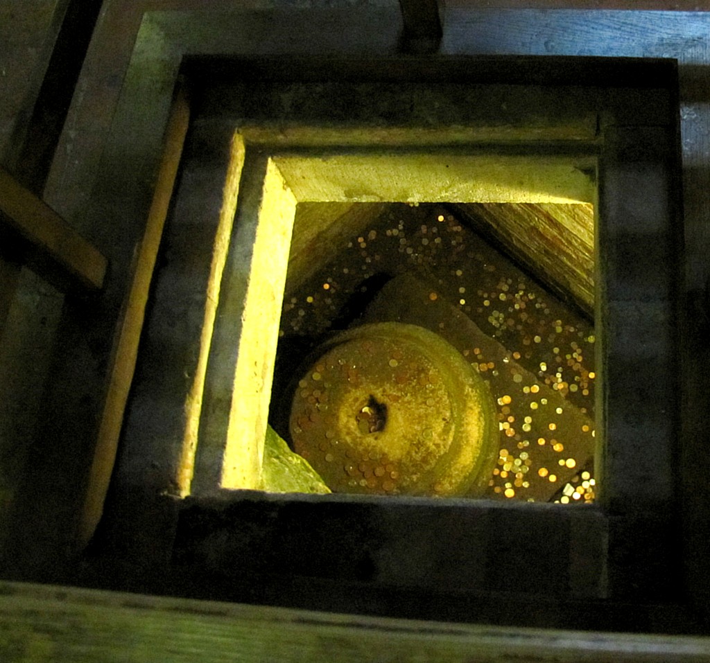 Below the foundations of the Minster, they found (surprise, surprise) Roman ruins. Here's a bit of a well in the basement that shows one of the pillars of the Roman fortress that once stood on this spot. And, because it's a hole in the ground, people throw coins in. I guess.