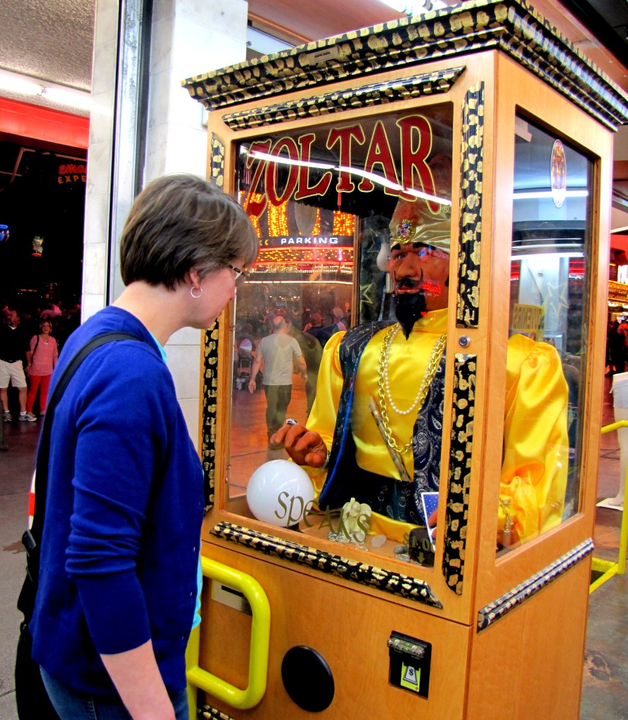 Sandy spotted the Zoltar machine, and stopped to have her fortune told.