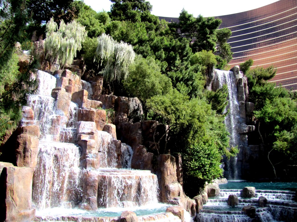 These waterfalls, entirely artificial, of course, are tucked in a twist of path in front of the Wynn casino, which is the copper building you can see in the background.