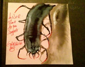 One of the Kickstarter rewards I picked up at the show was the Travels book for Shadows of Esteren. I left the book at the booth when I picked it up on Thursday, and the good folks there said they'd get is signed by everyone. When I finally remembered to pick it up again (I left the show without getting it, and if I hadn't had to come back to drop off Scott's keys, I might not have remembered it at all), I found that Gawain, the artist, had done a sketch for me in the book, as well! Those Esteren folks rock!